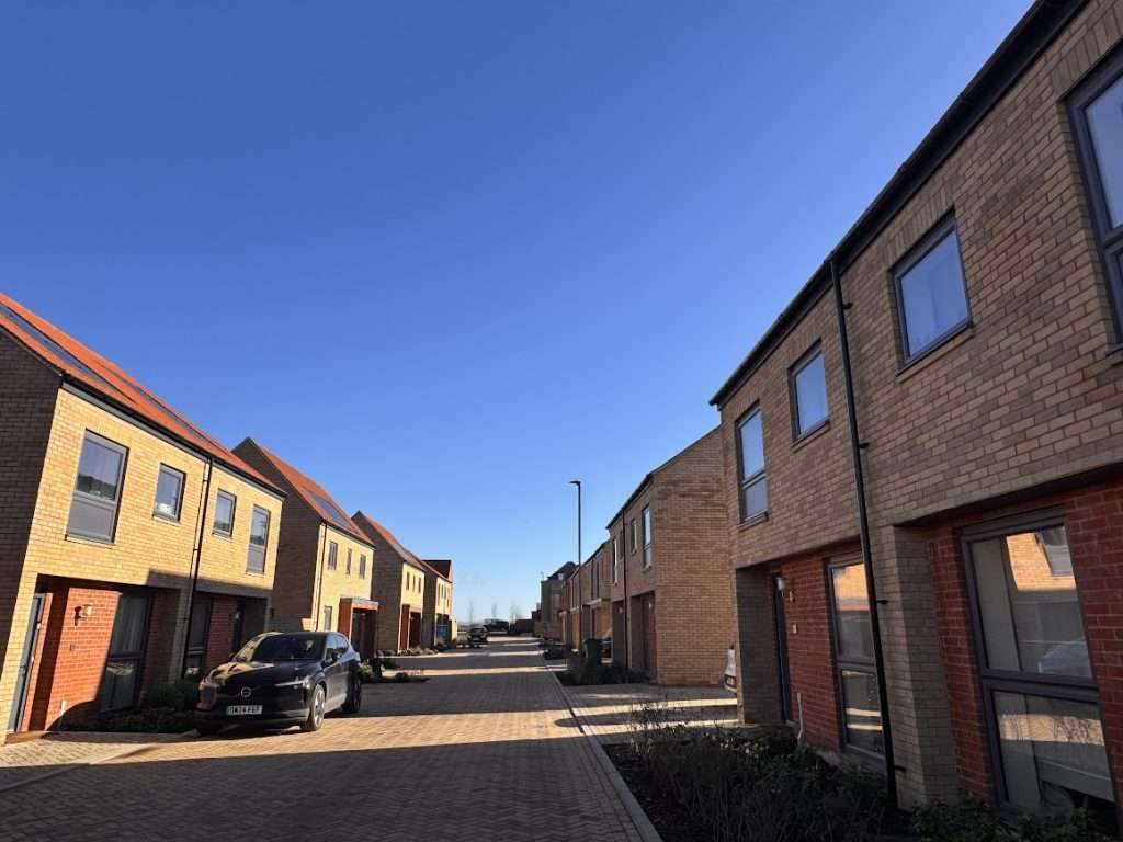 Modern houses with new extensions designed according to a flood risk ssessment